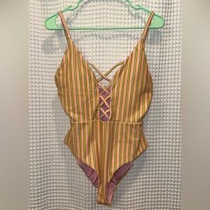 Dippin Daisys Bliss One piece. New with Tags. Size XL.